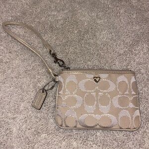 Coach gold and silver wristlet